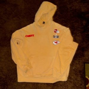 This is a Chiefs Super Bowl 2024 Win Hooded sweatshirt frm Harry Styles Pleasing